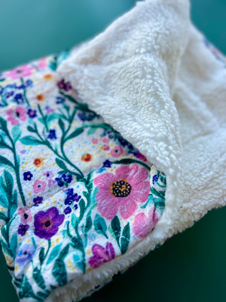 Manta acurrucada de pata de gallo rosa